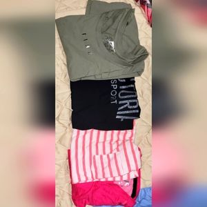 A bundle of for adorable women's shirts. 3 Victoria's Secret never worn